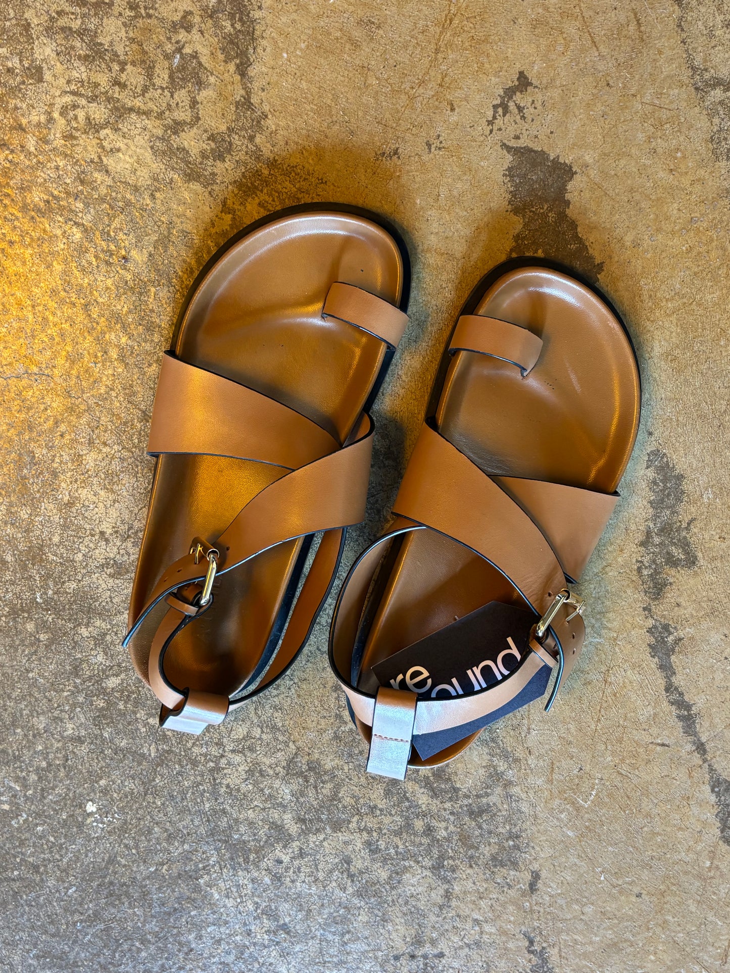 A. Emery Tan Sandals