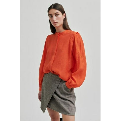 Second Female Orange Blouse