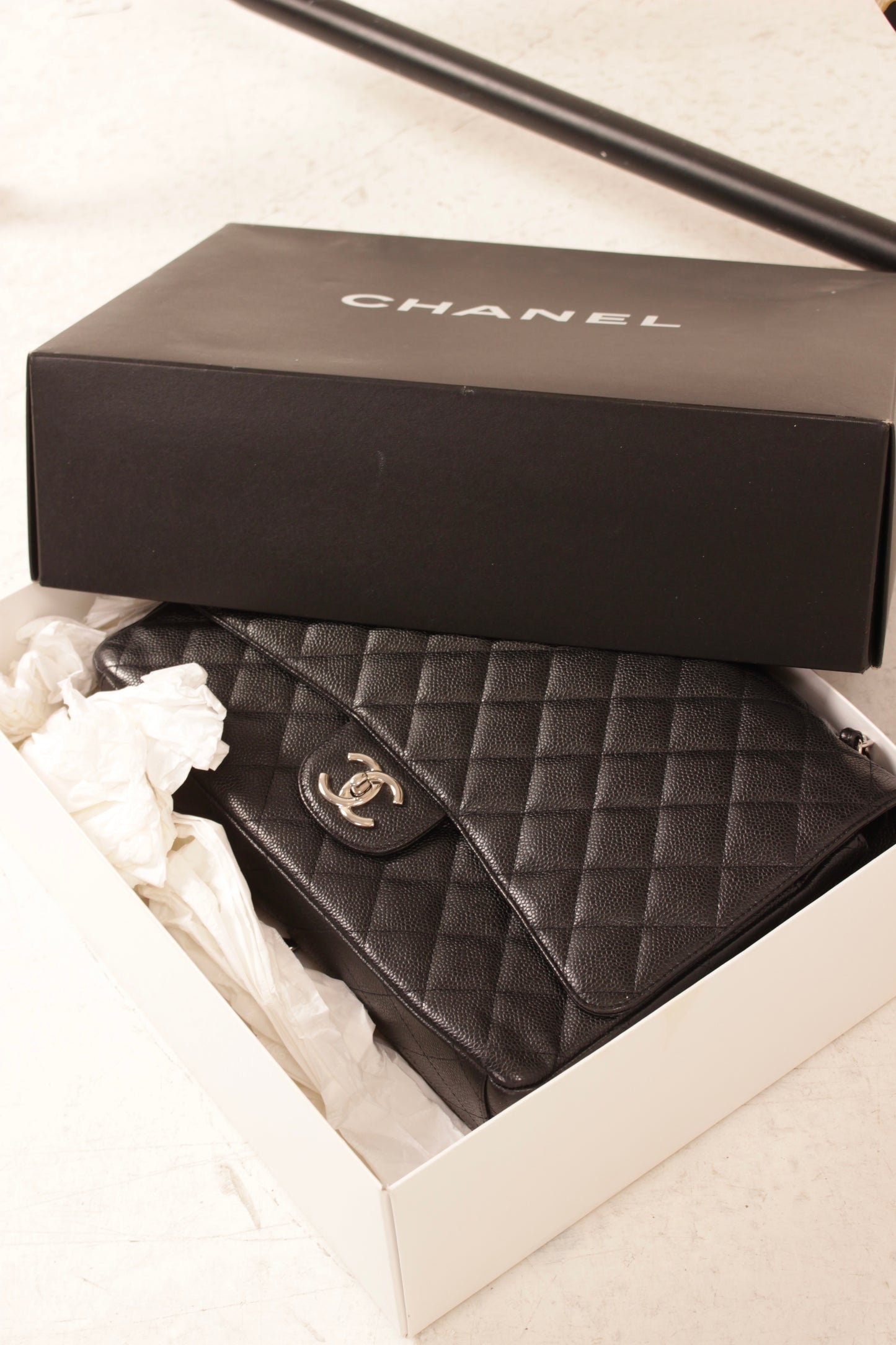 Chanel Black Caviar Maxi Double Flap Bag